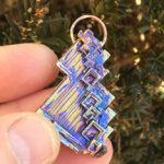 Bismuth purple vertical gem pendant.